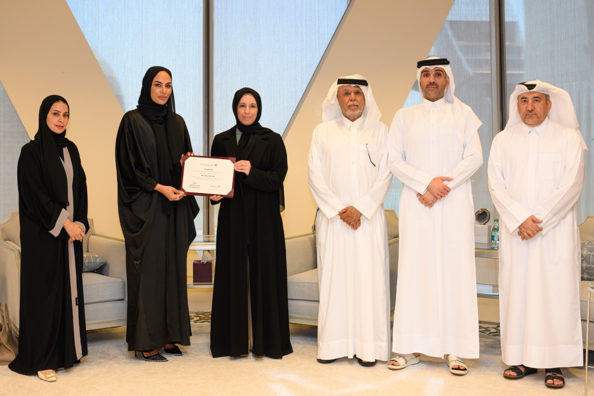 Minister of Social Development and Family HE Buthaina bint Ali Al Jabr Al Nuaimi (third left) with other officials at the event.