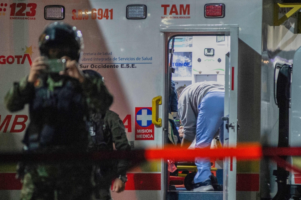 Senator Miguel Uribe Turbay receives medical treatment in an ambulance after being shot and wounded in Bogota on June 7, 2025. (Photo by AFP)