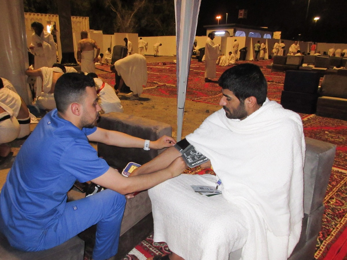 A pilgrim receives medical care provided Qatar Hajj Mission medical teams.