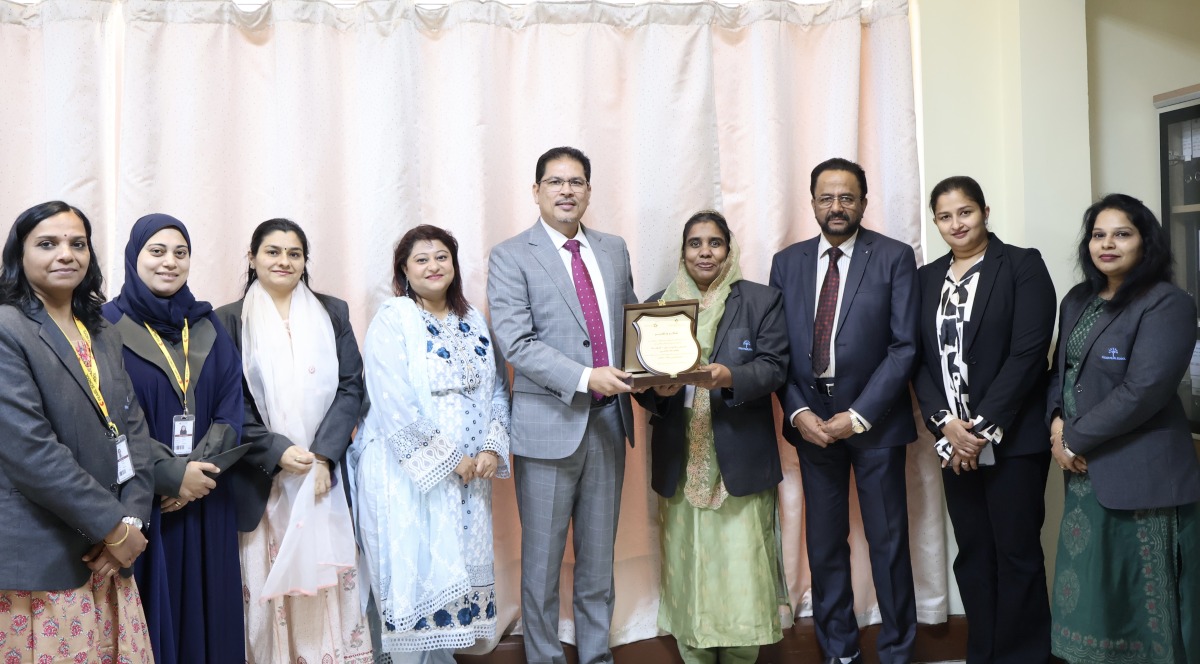 Officials from Pearl School, Al Dafna with the award.