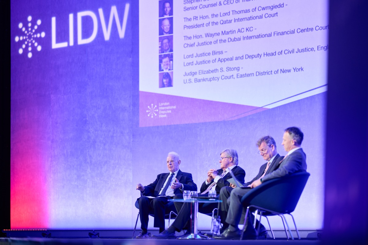 QICDRC delegates participating in a session of the event.