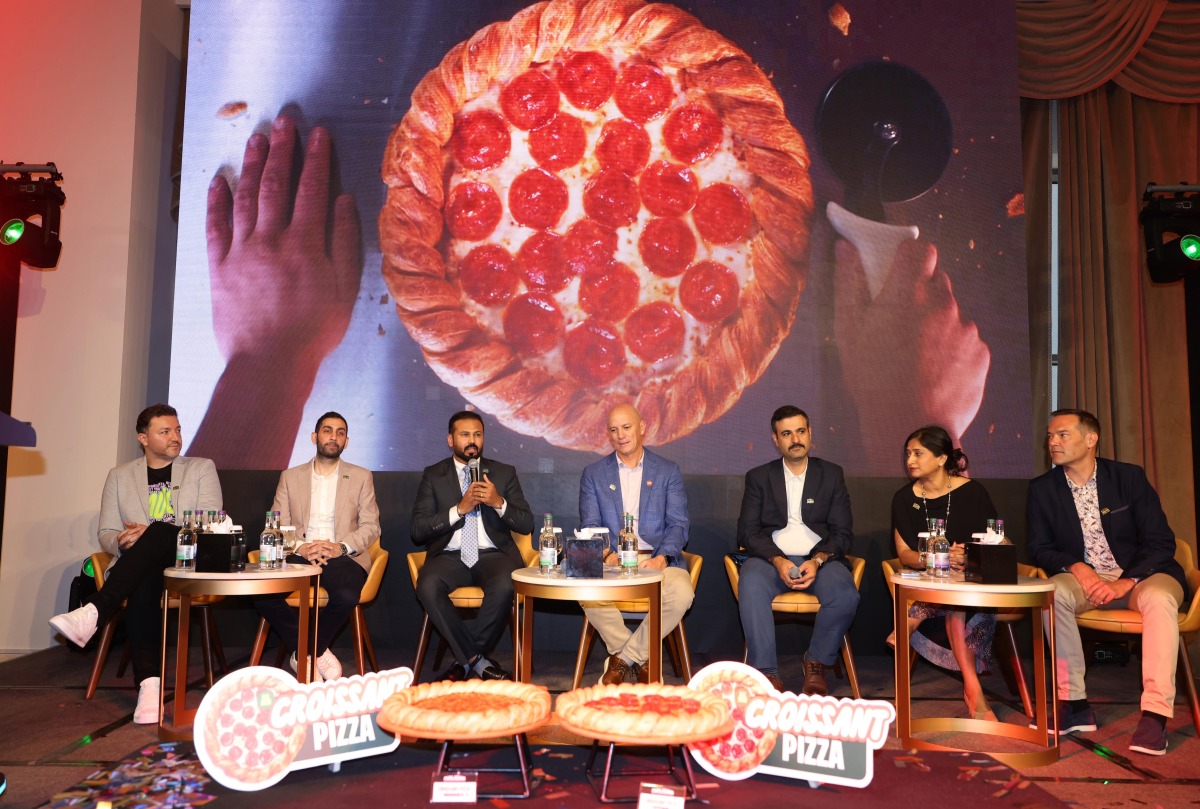 Papa Johns officials at the unveiling of the new croissant pizza in Qatar. PIC: Salim Matramkot/THE PENINSULA