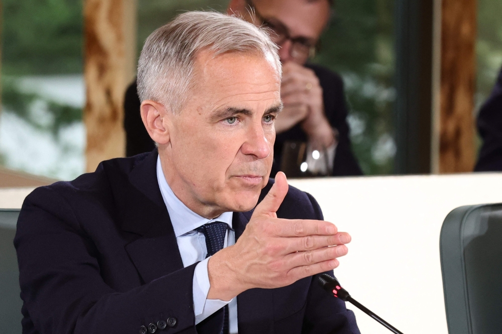 Canadian Prime Minister Mark Carney during an Outreach Session at the Group of Seven (G7) Summit at the Pomeroy Kananaskis Mountain Lodge in Kananaskis, Alberta, Canada on June 17, 2025. (Photo by Teresa Suarez / POOL / AFP)
