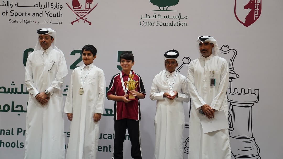 Officials with winning students on the occasion.