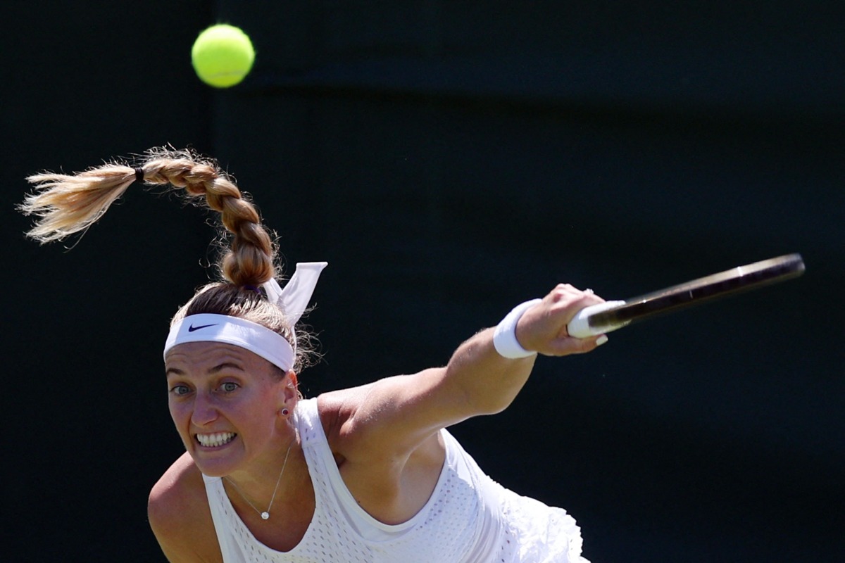 Czech Republic's Petra Kvitova serves to Belarus' Aliaksandra Sasnovich during their women's singles tennis match on the fifth day of the 2023 Wimbledon Championships at The All England Tennis Club in Wimbledon, southwest London on July 7, 2023. Photo by Adrian DENNIS / AFP