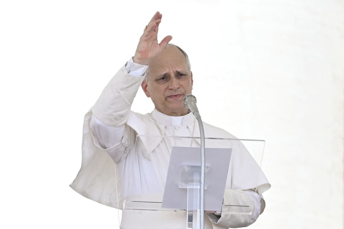Pope Leo XIV addresses the crowd for the Angelus prayer in The Vatican on June 15, 2025. Photo by Filippo MONTEFORTE / AFP.
