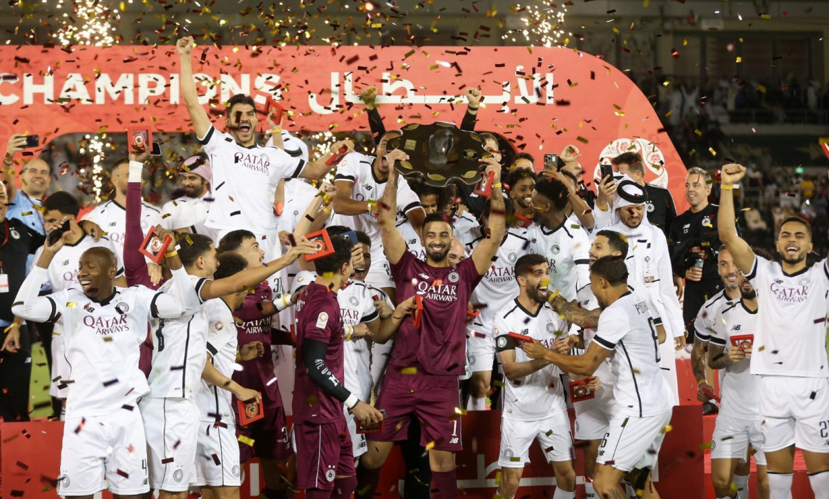 Al Sadd players celebrate with the Falcon Shield after being crowned as the QSL champions in this April 18, 2025 file photo.