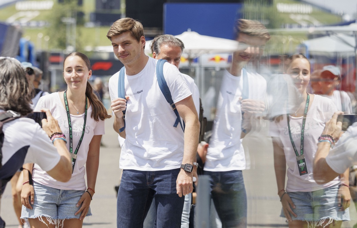 Red Bull Racing’s Dutch driver Max Verstappen is greeted by fans as he arrives at the Red Bull Ring race track in Spielberg, Austria, yesterday. 