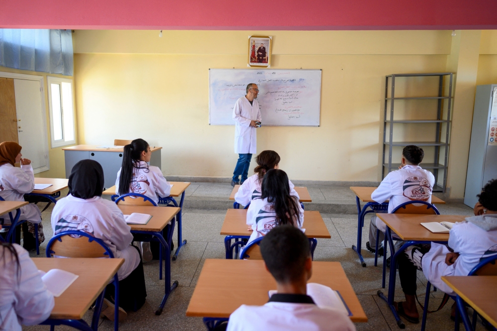Students attend an Arabic language class at the 