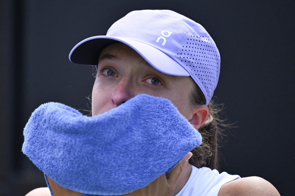 Poland's Iga Swiatek reacts after she was defeated by USA's Jessica Pegula (not pictured) during their final match of the 2025 WTA Bad Homburg Open Tennis Tournament on June 28, 2025 in Bad Homburg, western Germany. (Photo by Kirill Kudryavtsev / AFP)