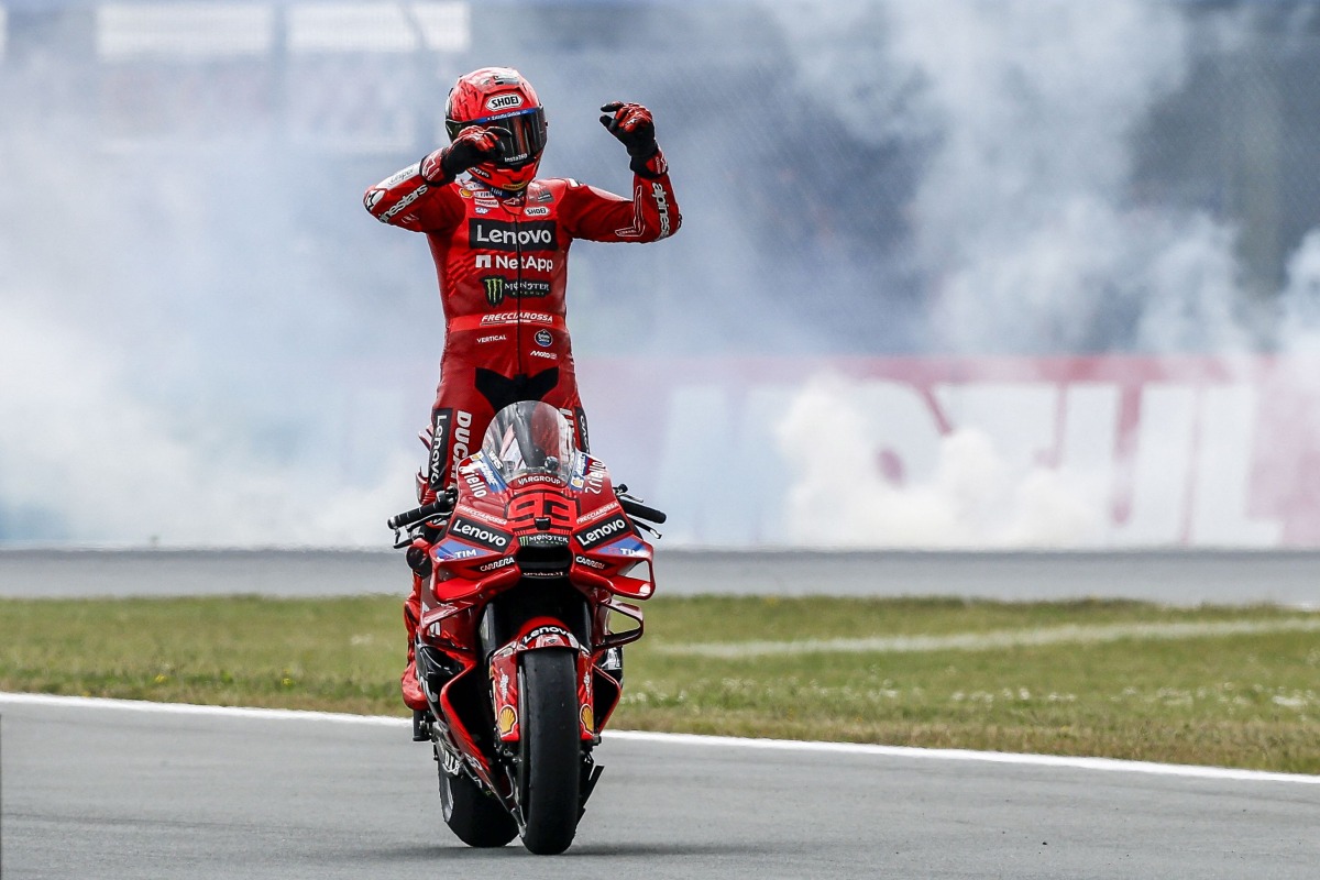 Ducati Lenovo Team's Spanish rider Marc Marquez celebrates after winning the MotoGP race as part of the Dutch Motorcycle Grand Prix at the TT Circuit Assen, in Assen, on June 29, 2025. (Photo by Vincent JANNINK / ANP / AFP) 