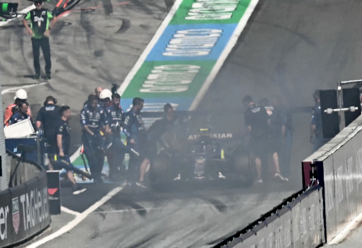 William's Spanish driver Carlos Sainz is seen in the pits during the Formula One Austrian Grand Prix at the Red Bull Ring race track in Spielberg, Austria, on June 29, 2025. (Photo by Joe Klamar / AFP)