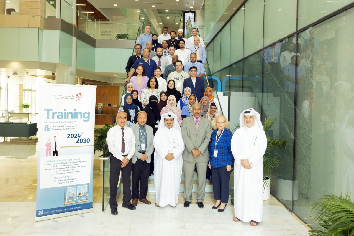 Officials and participants during the workshop.