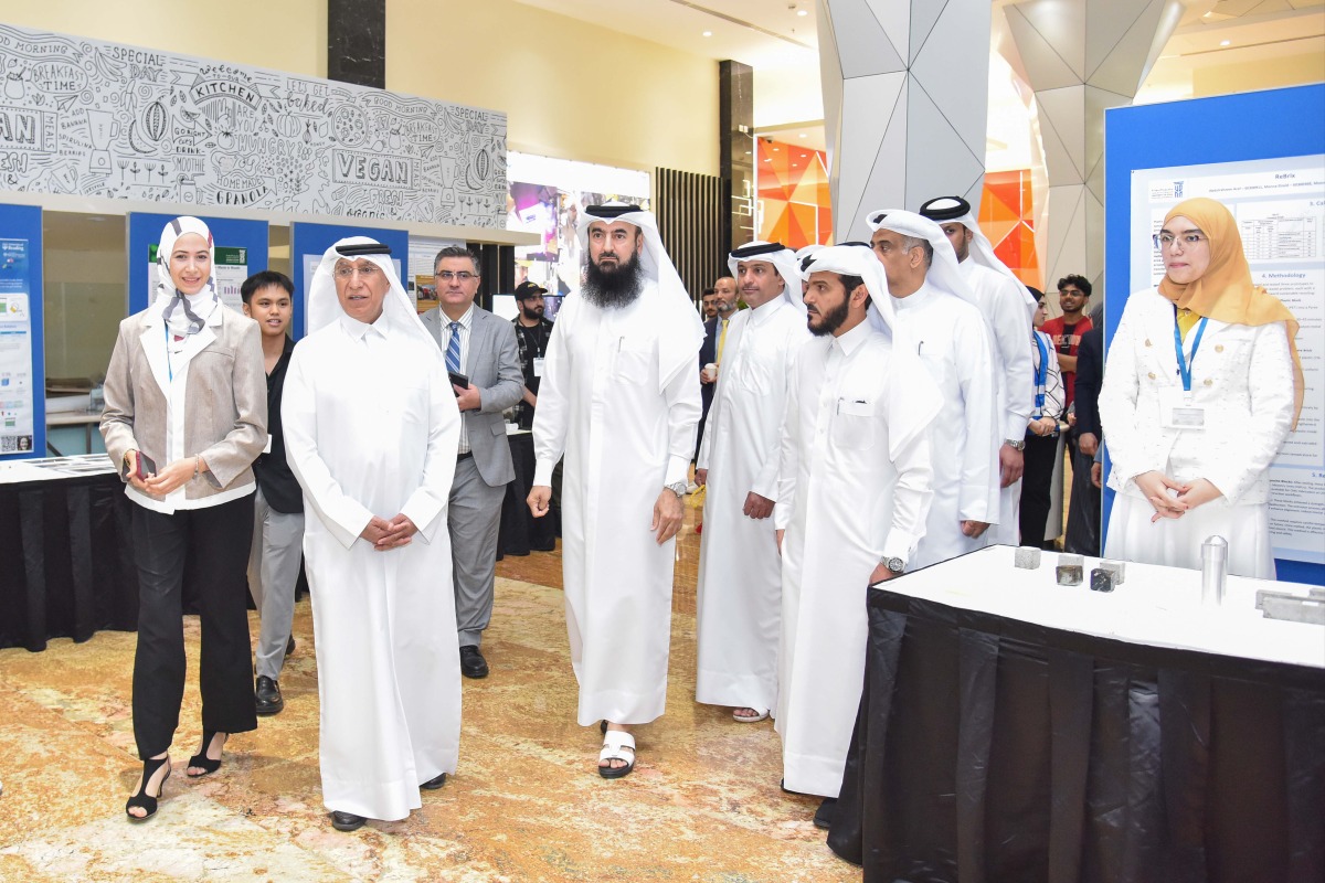  President of UDST Dr. Salem Al-Naemi and other officials during the event.
