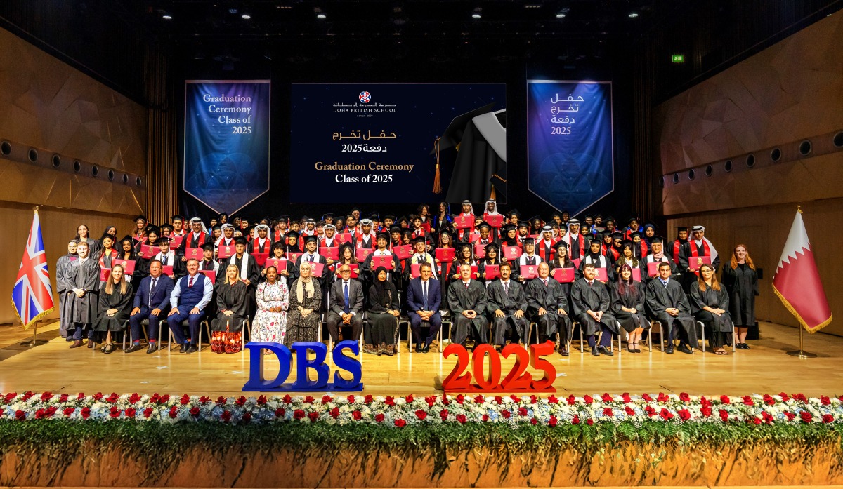 DBS officials and staff with the graduating students during the ceremony.