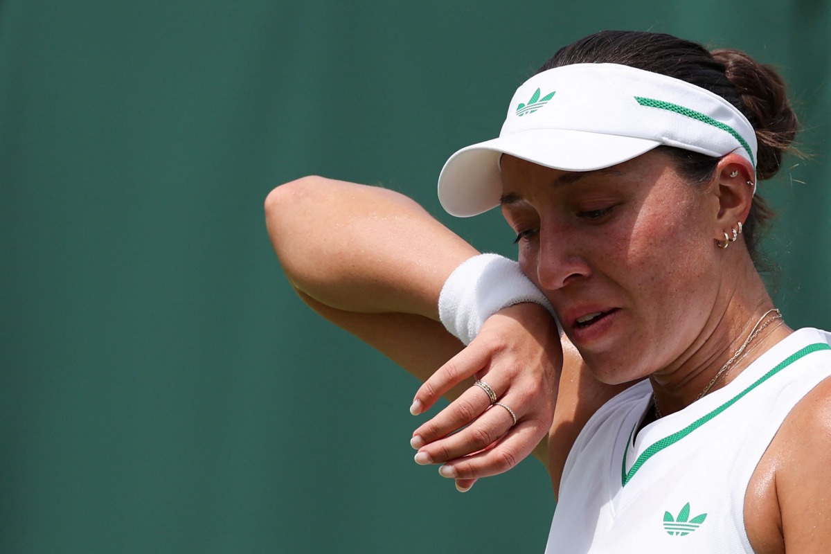 US player Jessica Pegula gestures as she plays against Italy's Elisabetta Cocciaretto during their women's singles first round tennis match on the second day of the 2025 Wimbledon Championships at The All England Lawn Tennis and Croquet Club in Wimbledon, southwest London, on July 1, 2025. (Photo by Adrian Dennis / AFP)