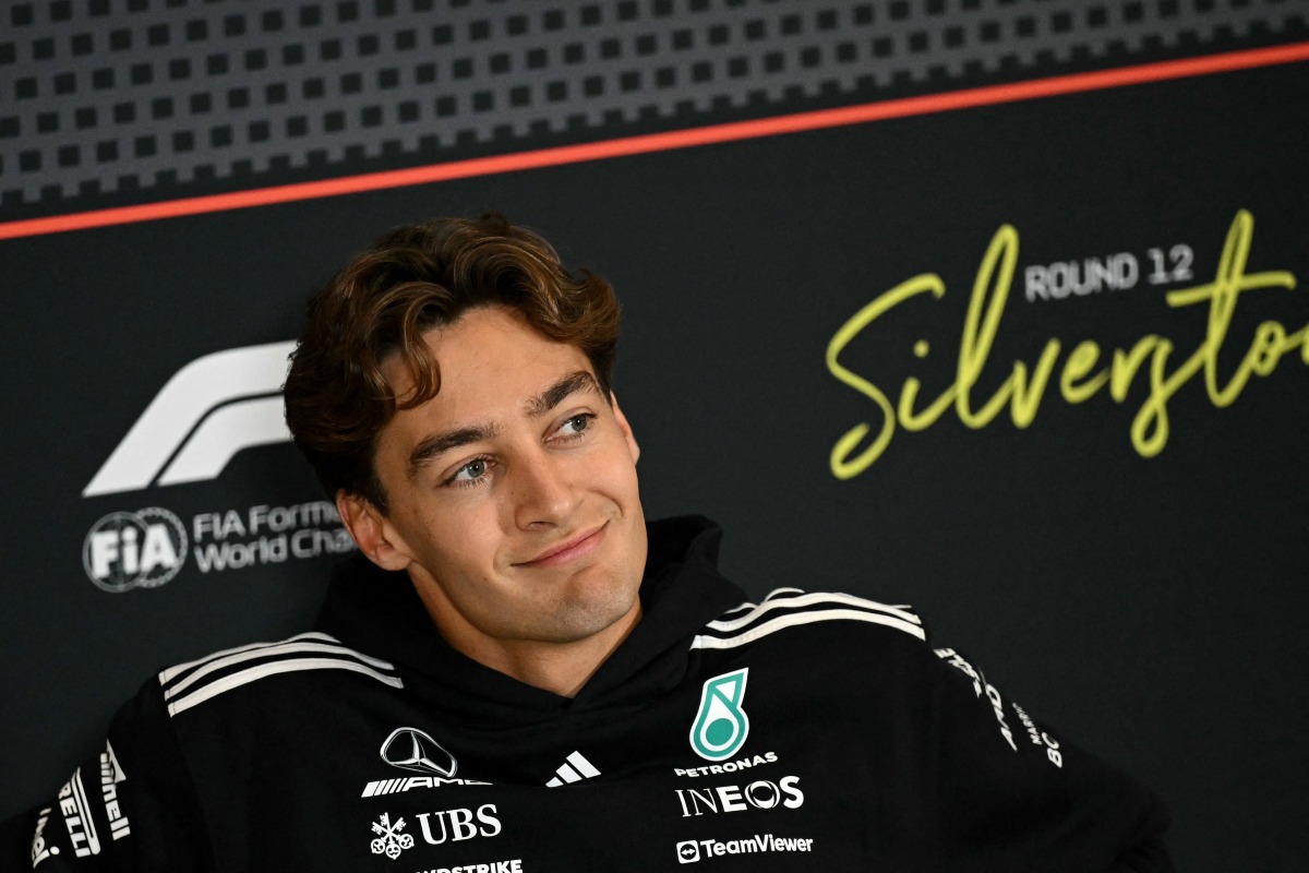 Mercedes' British driver George Russell looks on during a press conference ahead of the Formula One British Grand Prix at the Silverstone motor racing circuit in Silverstone, central England, on July 3, 2025. (Photo by Ben STANSALL / AFP)