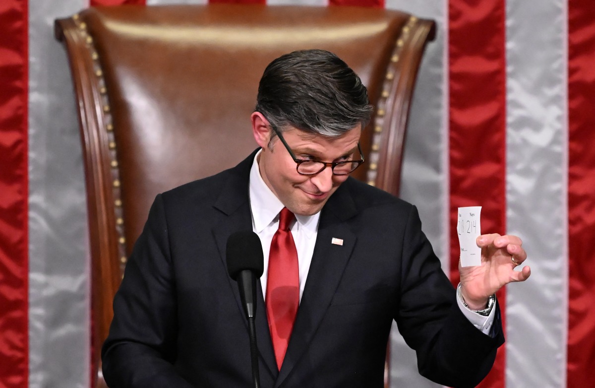 US House Speaker Mike Johnson shows the final tally of the vote on US President Donald Trump's tax bill on the floor of the House of Representatives at the US Capitol in Washington, DC, on July 3, 2025. Photo by Alex WROBLEWSKI / AFP.
