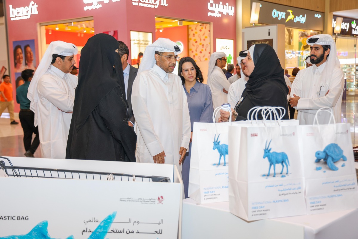 MECC officials with other people during an event to mark International Plastic Bag Free Day.