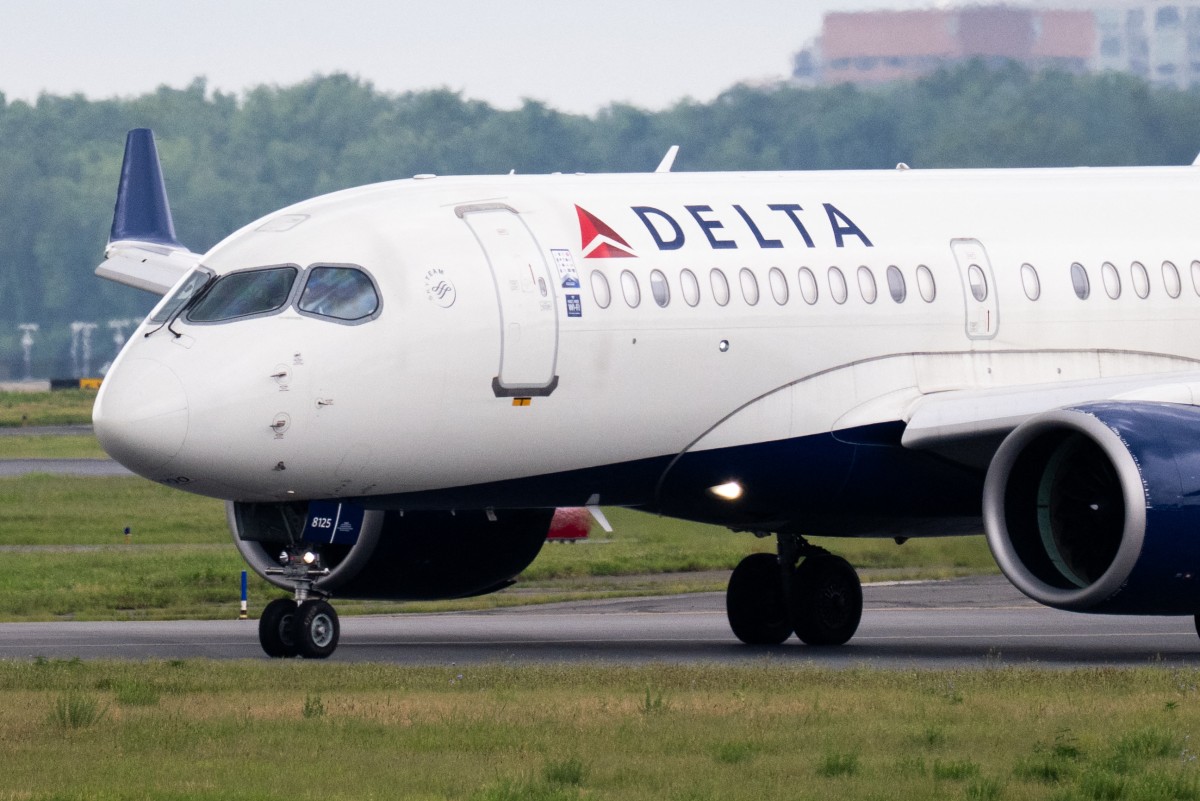 A Delta Air Lines Airbus A220 airplane prepares to takeoff at Ronald Reagan Washington National Airport in Arlington, Virginia, on July 10, 2025. Photo by SAUL LOEB / AFP.
