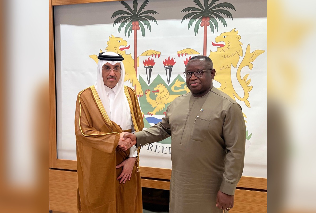 President of the Republic of Sierra Leone H E Julius Maada Bio with Minister of Labour H E Dr Ali bin Samikh Al Marri during the visit.