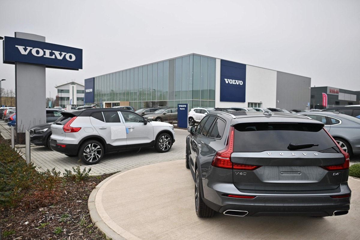 Volvo cars are seen on the forecourt of a Volvo dealership in Reading, west of London, on March 2, 2021. Photo by Ben STANSALL / AFP