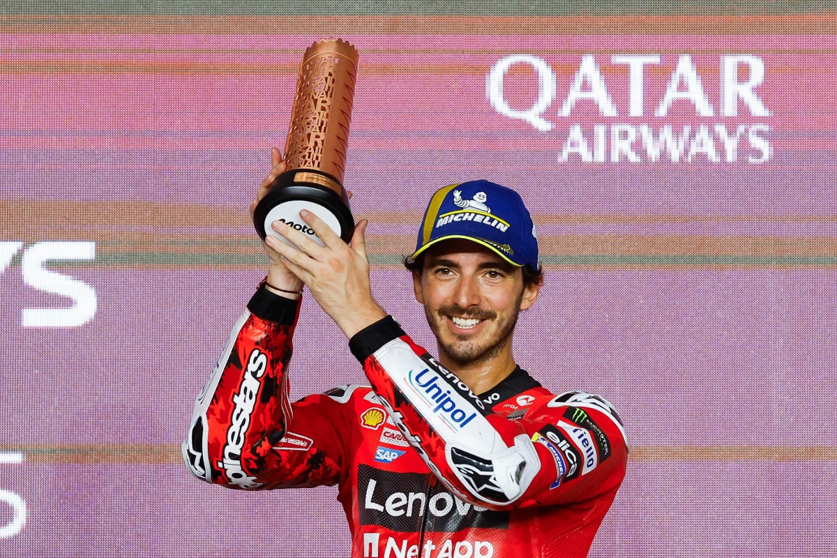 (FILES) Third-placed Aprilia Racing's Spanish rider Jorge Martin celebrates on the podium at the end of the Qatar MotoGP Grand Prix at the Lusail International Circuit in Lusail, north of Doha on April 13, 2025. (Photo by Karim JAAFAR / AFP)

