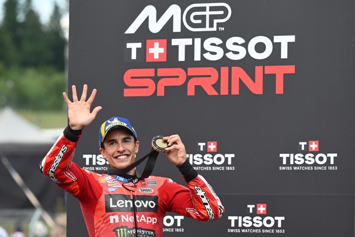 Ducati Lenovo Team’s Marc Marquez celebrates after winning the Czech Moto GP Grand Prix sprint race.