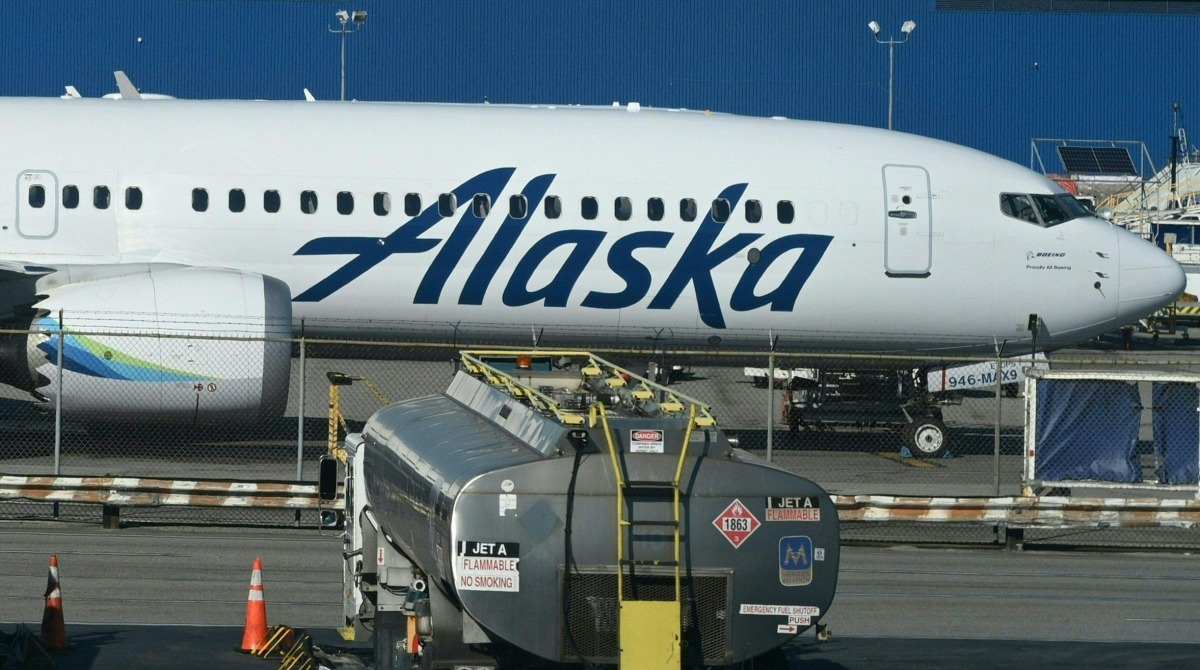 An Alaska Airlines Boeing 737 MAX 9 plane is parked on the tarmac at Los Angeles International Airport on January 8, 2024, in Los Angeles. Photo by Daniel SLIM / AFP