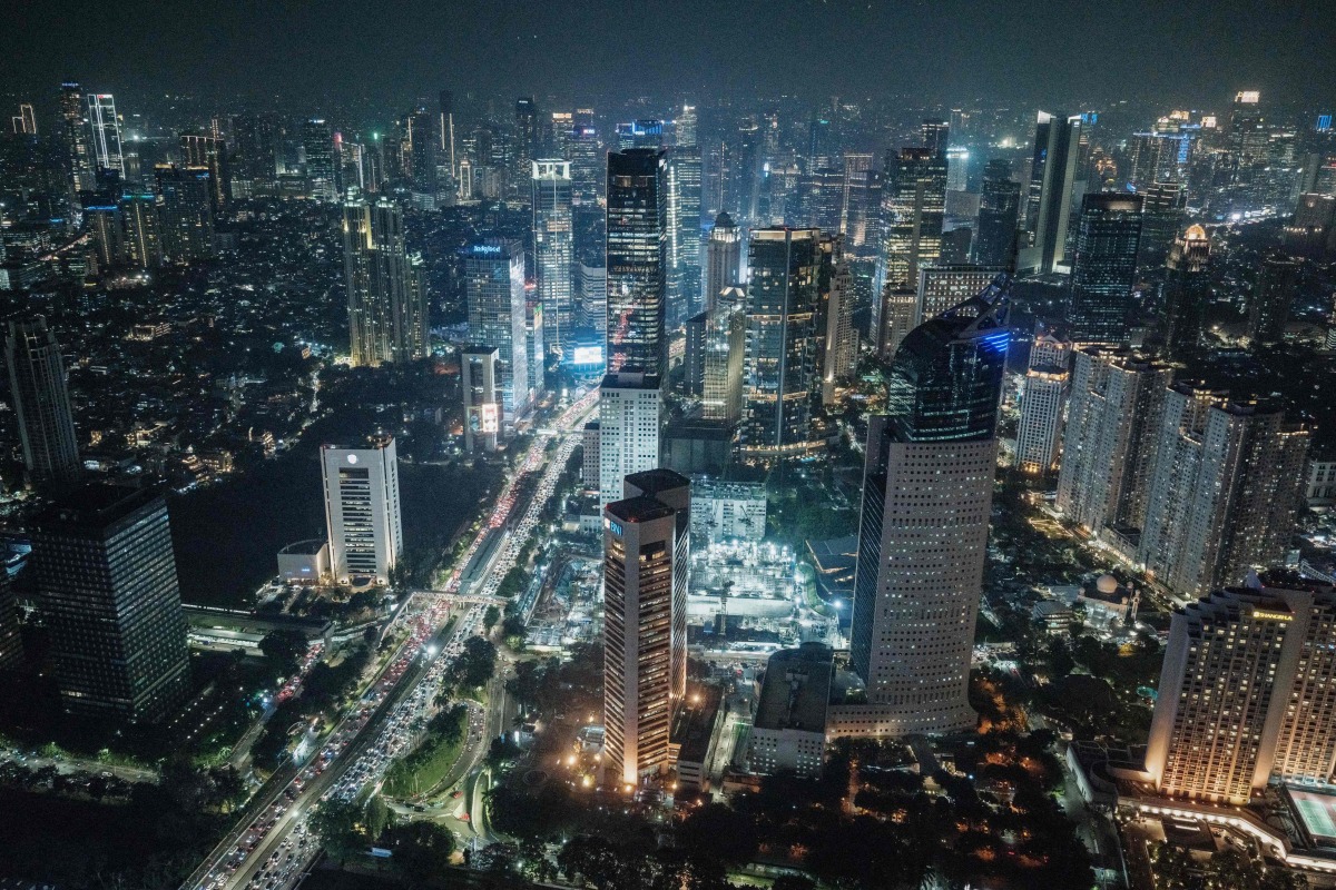 A general view of the city from an observatory deck claimed to be Indonesia's highest, at the Thamrin Nine building in Jakarta on July 24, 2025. (Photo by Yasuyoshi CHIBA / AFP)
