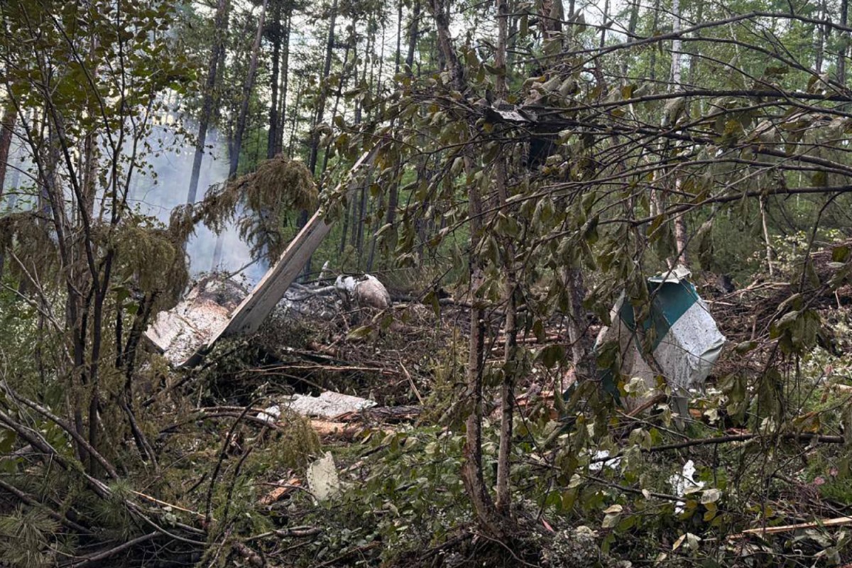 This handout picture released by the Far Eastern Transport Prosecutor's Office on July 24, 2025, shows what it said is the crash site of the Antonov AN-24 passenger plane outside the town of Tynda in Russia's far eastern Amur region. (Photo by Handout / Far Eastern Transport Prosecutor's Office / AFP) 