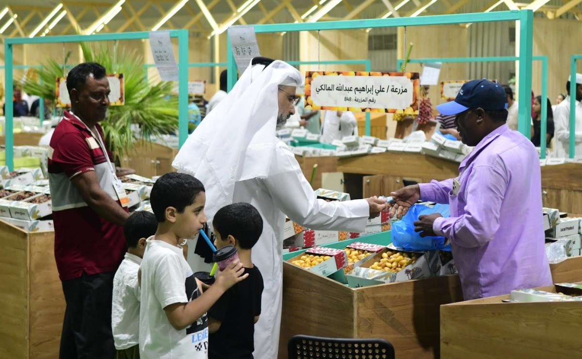 Visitors and traders at the Local Dates Festival.