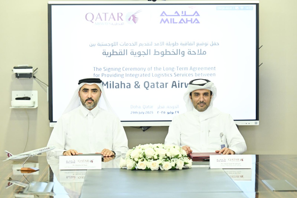 Qatar Airways Group and Milaha officials during the signing ceremony.