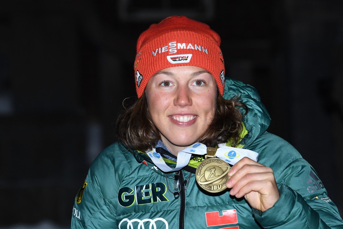 German Biathlete Laura Dahlmeier celebrates during the medal ceremony of the women's 10km pursuit competition at the IBU Biathlon World Championships in Ostersund, Sweden, on March 10, 2019. Photo by Jonathan NACKSTRAND / AFP