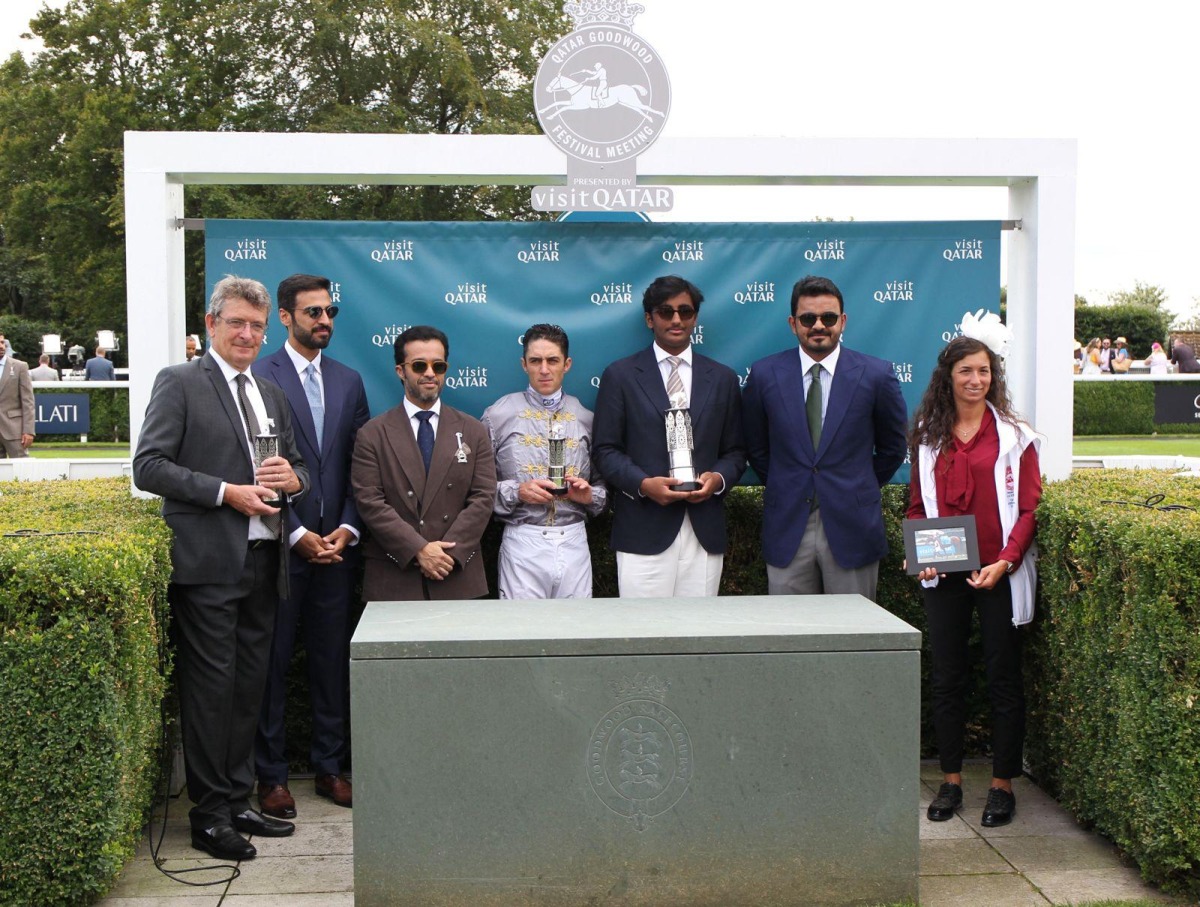Qatar Olympic Committee President H E Sheikh Joaan bin Hamad Al Thani, H E Sheikh Hamad bin Joaan Al Thani and Chairman of Qatar Tourism and Chair of the Board of Directors of Visit Qatar H E Saad bin Ali Al Kharji, trainer Francois Rohaut and jockey Christophe Soumillon pose on the podium.  