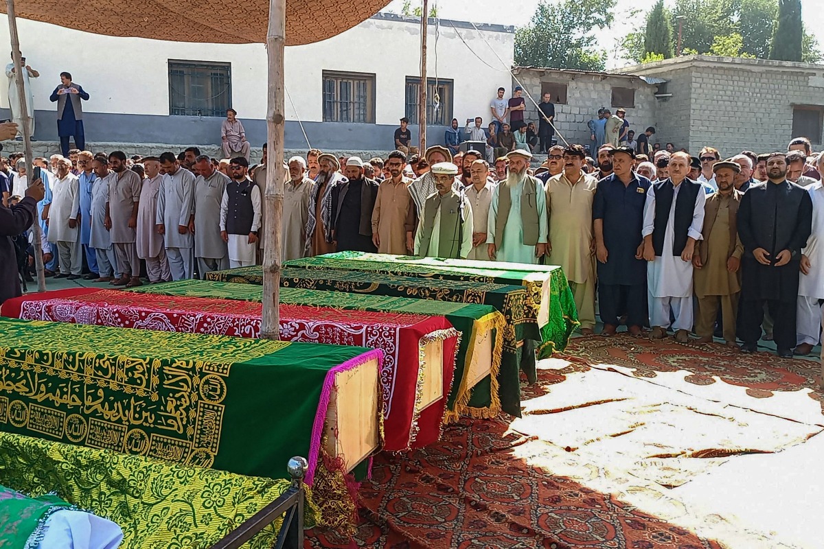 Local residents offer funeral prayers for mudslide victims in Danyor village in Pakistan's Gilgit-Baltistan region on August 11, 2025. Photo by AFP