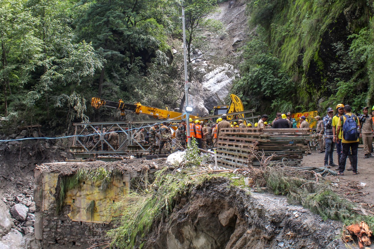 Army and rescue personnel construct a bailey bridge near the Bhatwari village in the Uttarkashi district on August 8, 2025. (Photo by AFP)
