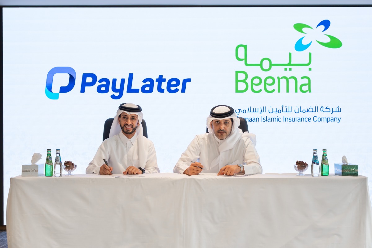 CEO of Damaan Islamic Insurance Company – Beema, Nasser Rashid Al Misnad (right) and Co-Founder and Managing Partner of PayLater Mohammed Al-Delaimi during the agreement signing ceremony.