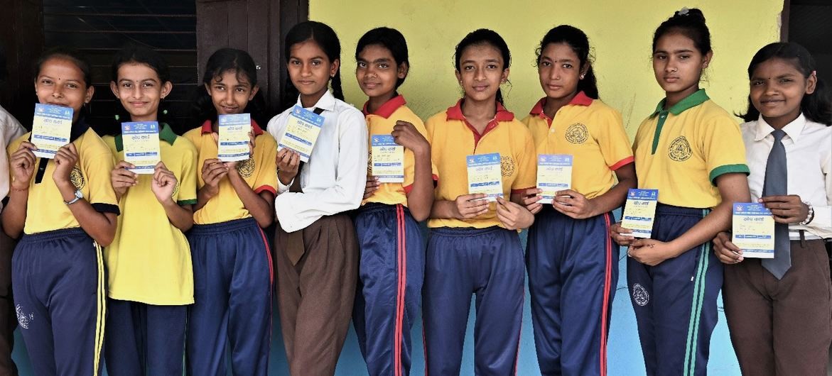 A group of students wait in line to get vaccinated against Measles-Rubella during the Outbreak Response Immunization campaign in Mahottari district of Madhesh Province in Nepal. (Photo: World Health Organization)
