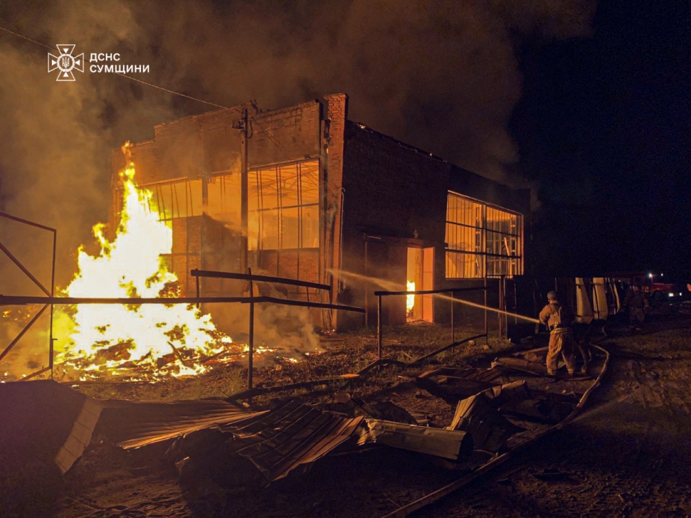 This handout photograph taken and released by the Ukrainian Emergency Service on August 20, 2025, shows a Ukrainian emergency worker in action following an air attack, in Okhtyrka, Sumy region, amid the Russian invasion of Ukraine. (Photo by Handout / Ukrainian Emergency Service / AFP)
