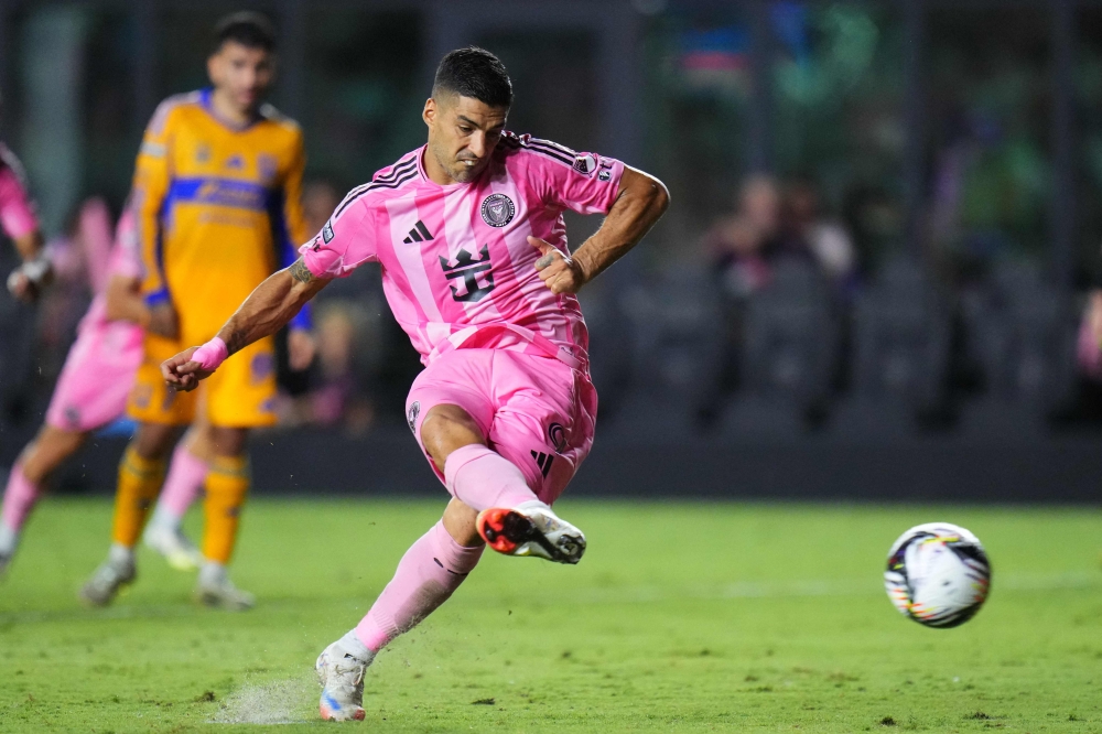 Luis Suarez of Inter Miami CF takes a penalty and scores the team's second goal on August 20, 2025 in Fort Lauderdale, Florida. Rich Storry/Getty Images/AFP 
