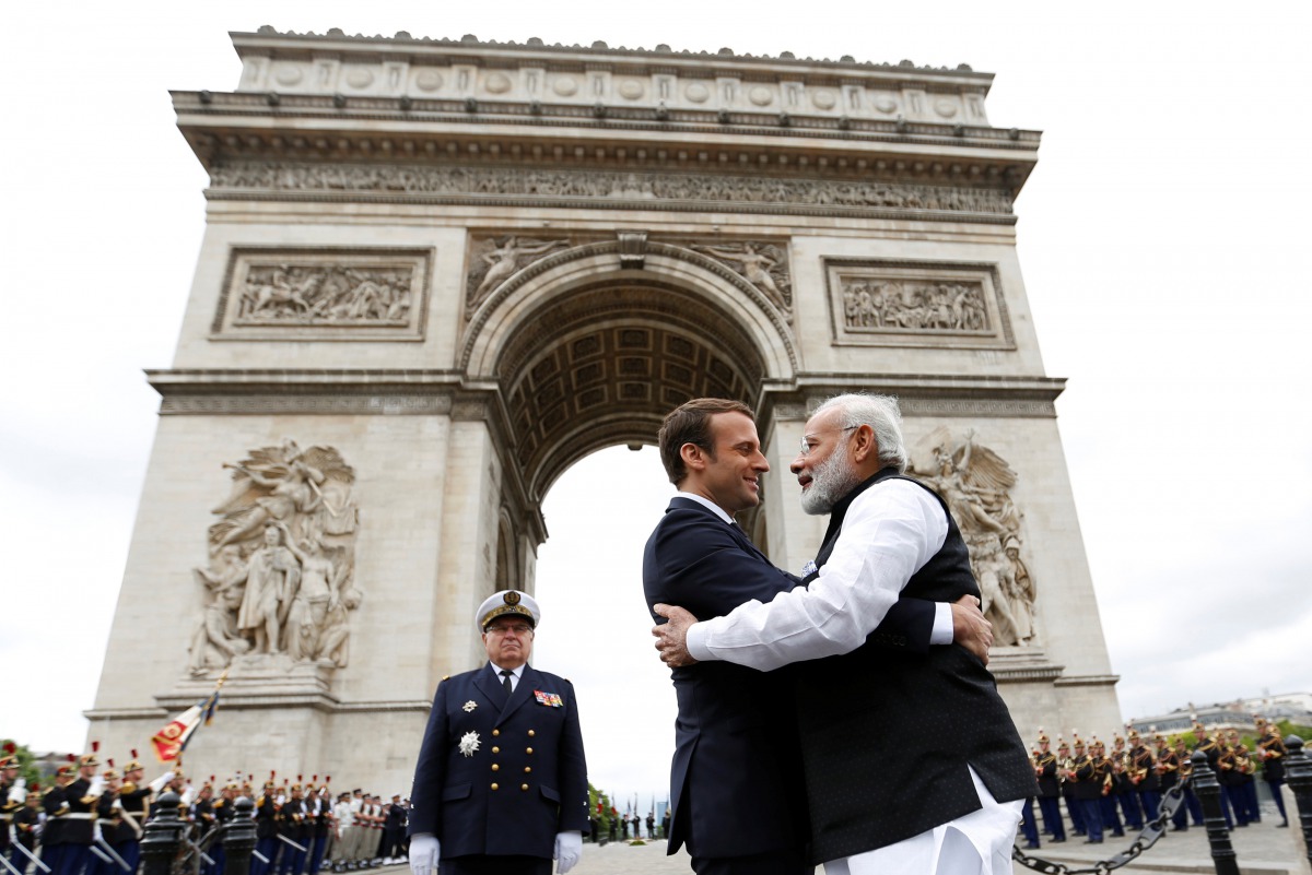 File: Indian Prime Minister Narendra Modi and French President Emmanuel Macron after a ceremony at the Arc de Triomphe in Paris on June 3, 2017. (Photo by Charles Platiau/Reuters/File)