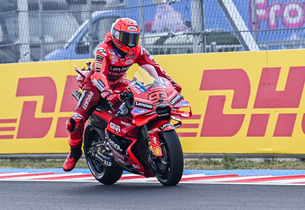Ducati Lenovo Team's Spanish rider Marc Marquez drives during the practice of motorcycle Hungarian Moto GP Grand Prix on August 22, 2025. (Photo by Attila Kisbenedek / AFP)