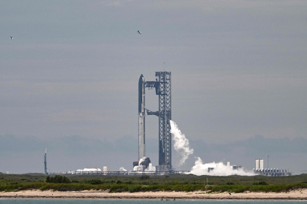 SpaceX's Starship is seen on the launchpad in Starbase, Texas, on August 24, 2025. (Photo by Ronaldo Schemidt / AFP)