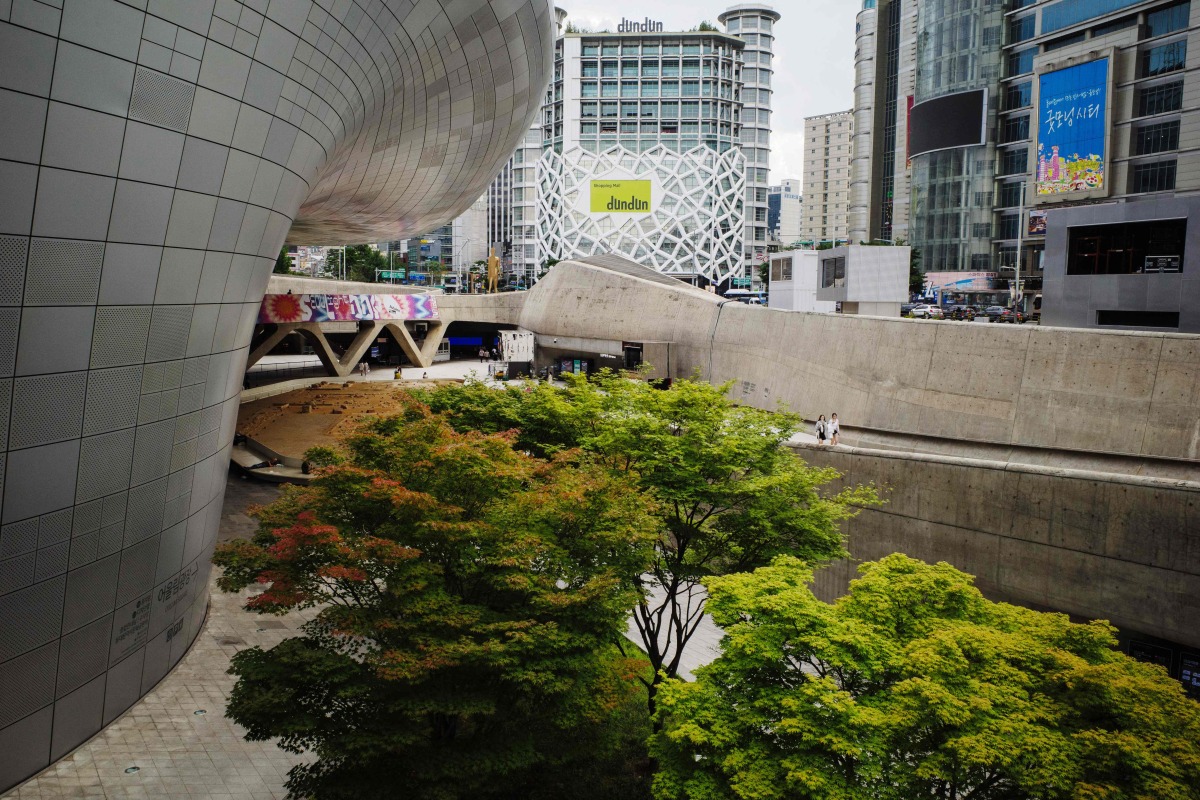 A general view shows the Dongdaemun Design Plaza (DDP) and surrounding buildings in Seoul on August 25, 2025. (Photo by ANTHONY WALLACE / AFP)