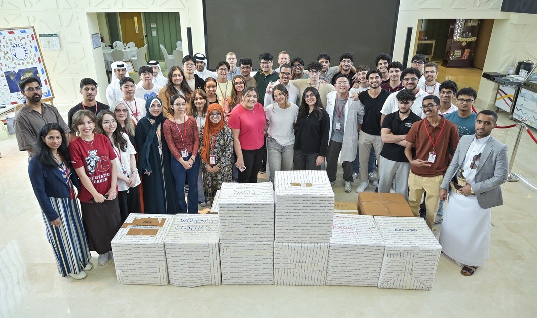 WCM-Q  new students took part in a hands-on initiative by packing donation boxes.