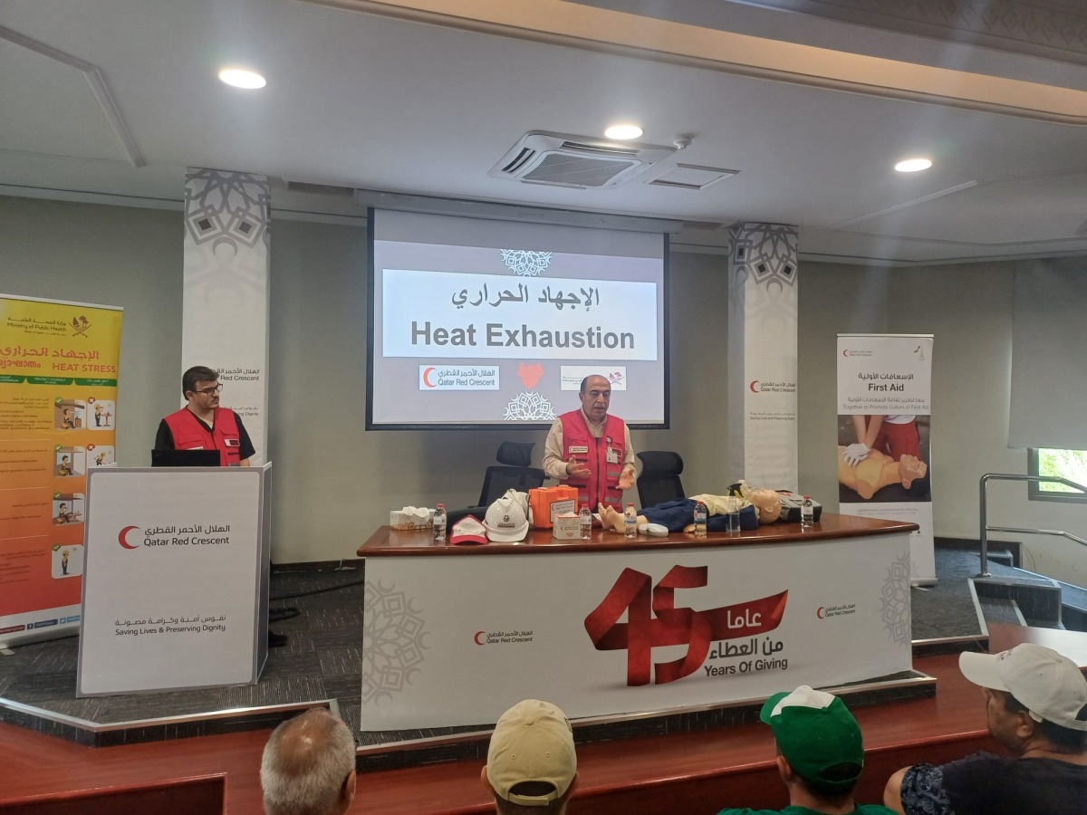 Trainers in action during the awareness lecture.