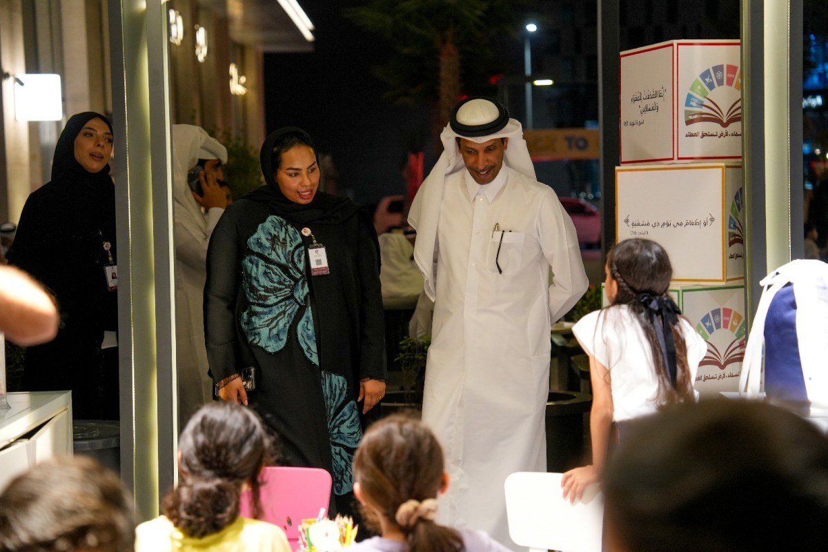 Officials and students during a Back-to-School event.