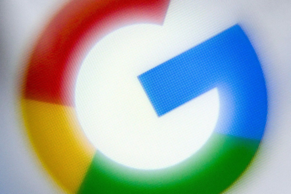 This illustration photograph taken on December 22, 2023, shows the logo of US multinational technology and Internet-related services company Google displayed on a smartphone's screen, in Frankfurt am Main, western Germany. 
