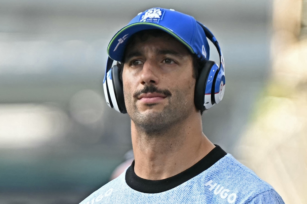 RB's Australian driver Daniel Ricciardo arrives for the drivers' parade before the Formula One Singapore Grand Prix night race at the Marina Bay Street Circuit in Singapore on September 22, 2024. (Photo by Lillian SUWANRUMPHA / AFP)

